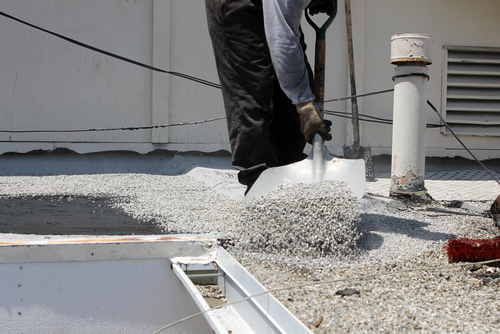 installing ballasted roof system with gravel